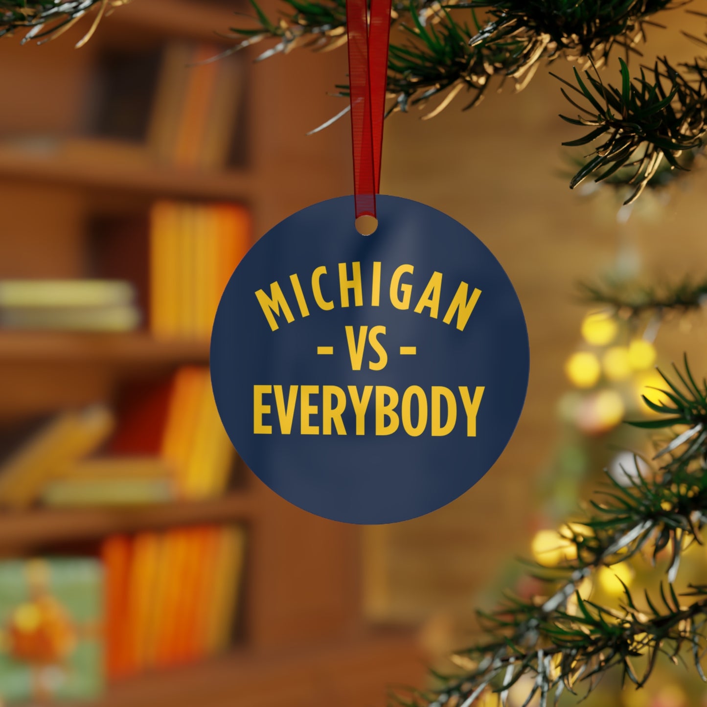 Michigan vs Everyone Ornaments. Four styles to choose from; Round, Oval, Christmas Tree and Bell. Front says Michigan vs Everyone, back says GO BLUE
