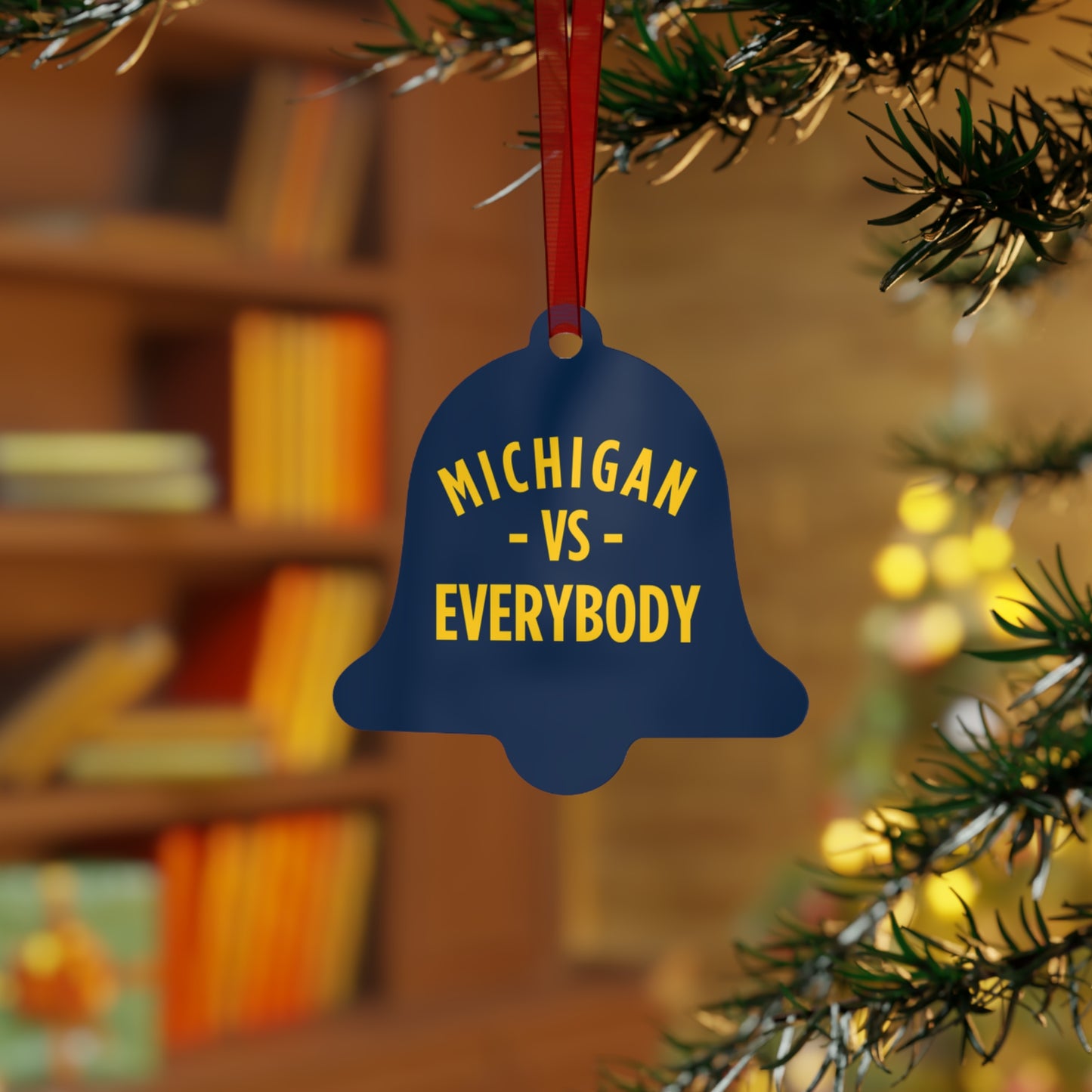 Michigan vs Everyone Ornaments. Four styles to choose from; Round, Oval, Christmas Tree and Bell. Front says Michigan vs Everyone, back says GO BLUE