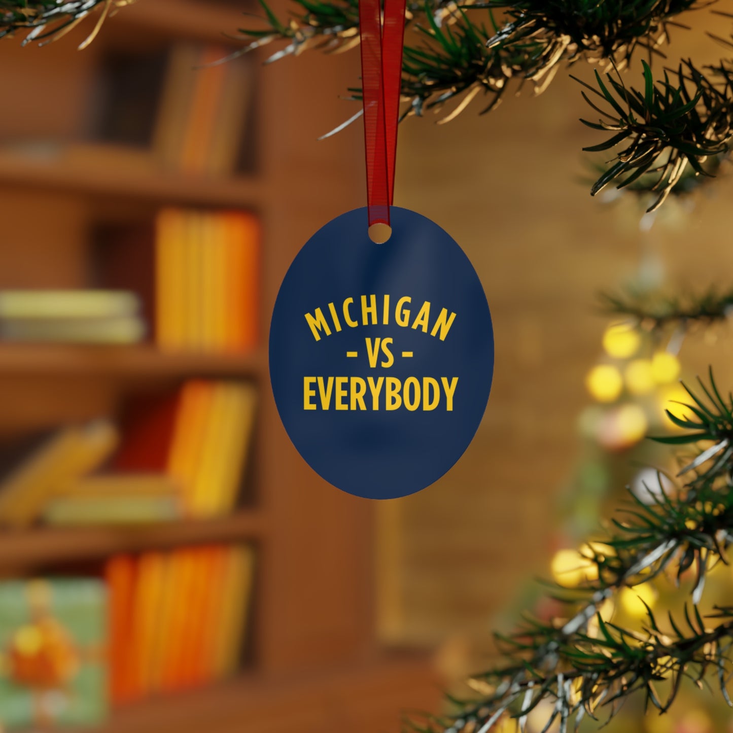 Michigan vs Everyone Ornaments. Four styles to choose from; Round, Oval, Christmas Tree and Bell. Front says Michigan vs Everyone, back says GO BLUE