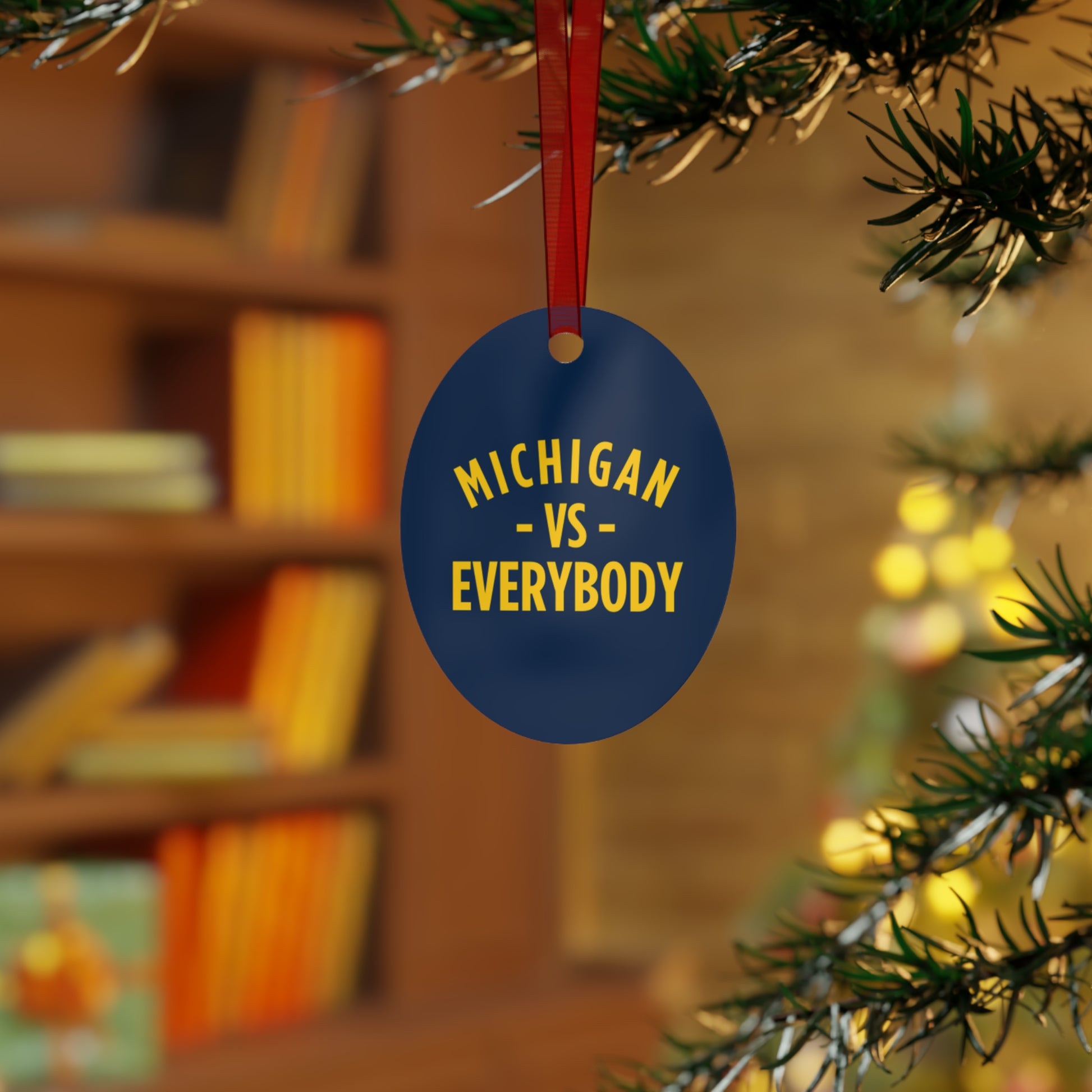 Michigan vs Everyone Ornaments. Four styles to choose from; Round, Oval, Christmas Tree and Bell. Front says Michigan vs Everyone, back says GO BLUE