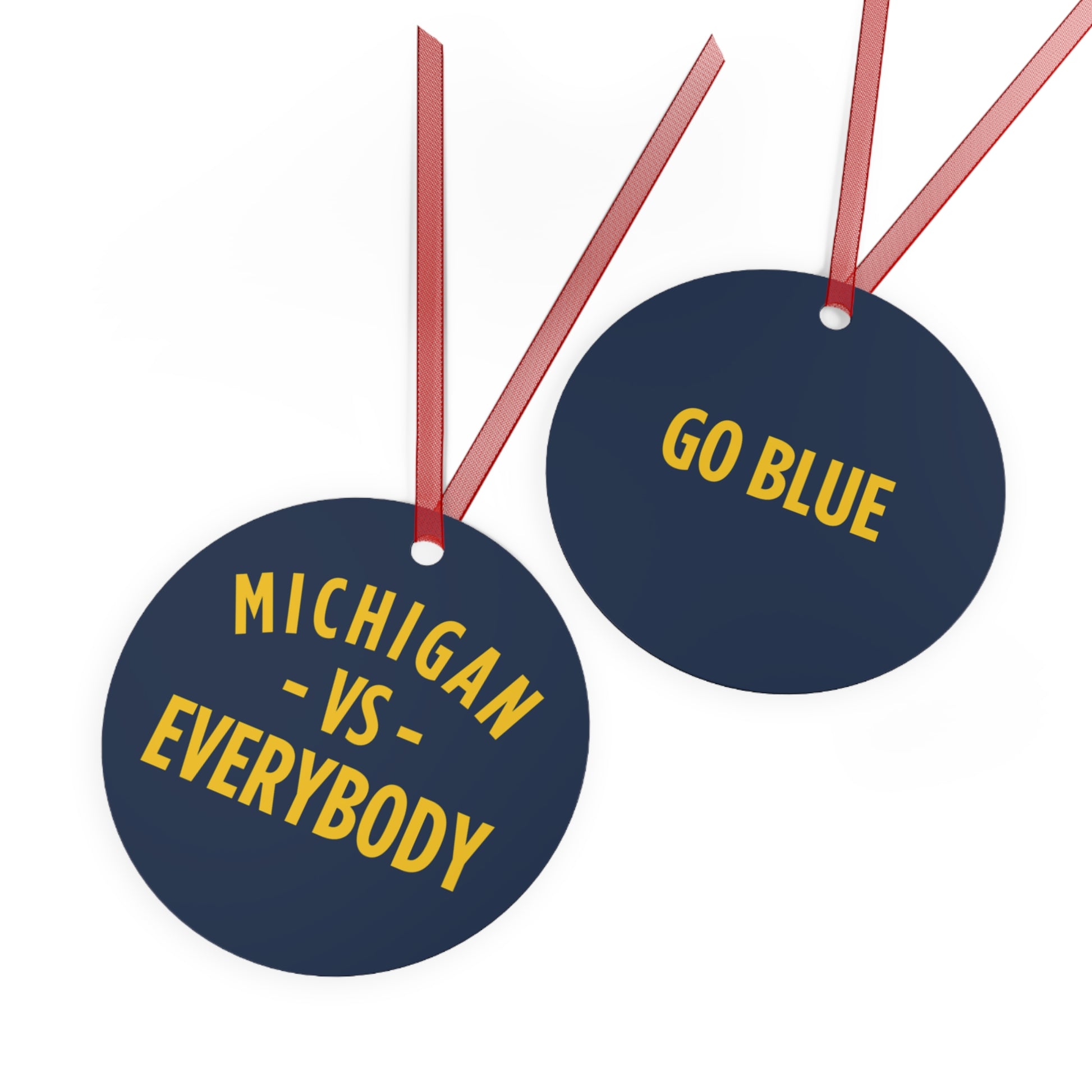 Michigan vs Everyone Ornaments. Four styles to choose from; Round, Oval, Christmas Tree and Bell. Front says Michigan vs Everyone, back says GO BLUE